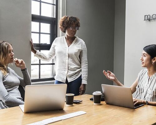 coffee-colleagues-digital-device-discussing